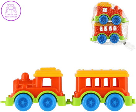 Vláček barevný mini sada mašinka + vagónek 10cm plast v síťce